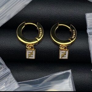 Gold Hoop Earrings with Logo Charm
